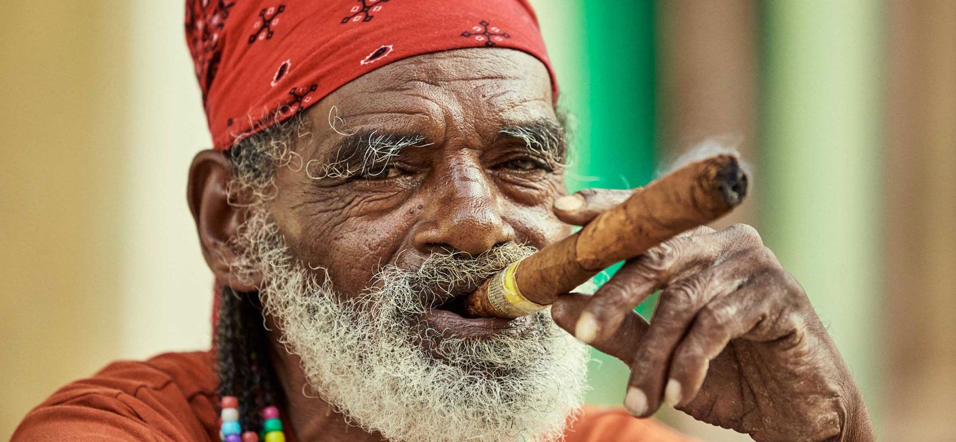 Cuban Man Smokes Cuban Cigar.